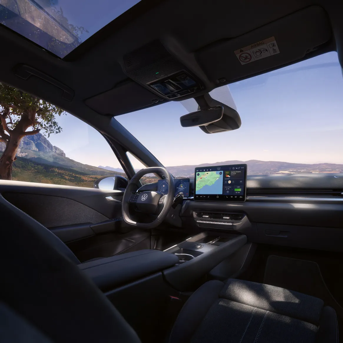Fahrersitz und Cockpit eines VW ID.3 Neo, vom Beifahrersitz aus gesehen